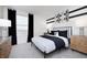 Stylish bedroom with black accents, modern furniture, and natural light at 569 Dalton Way, Avon, IN 46123