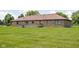 View of the backyard with large grassy lawn and a spacious back deck at 5905 N County Rd 600 E, Brownsburg, IN 46112