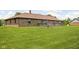 Large grassy backyard lawn features a spacious wooden back deck at 5905 N County Rd 600 E, Brownsburg, IN 46112