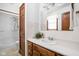 Bathroom features a vanity with wooden cabinets, tile flooring, and a separate shower area at 5905 N County Rd 600 E, Brownsburg, IN 46112