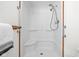 Bathroom features a walk-in shower with safety bars and a white shower stall at 5905 N County Rd 600 E, Brownsburg, IN 46112