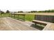 The wooden deck features a seating area and a view of a grassy backyard at 5905 N County Rd 600 E, Brownsburg, IN 46112