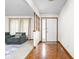 Bright foyer featuring hardwood floors, a neutral color palette, and a cozy sitting area at 5905 N County Rd 600 E, Brownsburg, IN 46112