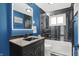 Modern bathroom featuring a glass-enclosed shower and stylish vanity at 634 Park Dr, Greenwood, IN 46143