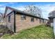 Classic brick home with well-maintained lawn and windows at 634 Park Dr, Greenwood, IN 46143