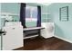 Laundry room featuring new appliances, a folding table, and shelving at 634 Park Dr, Greenwood, IN 46143