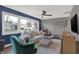 Cozy living room with a plush sofa, accent chair, and plenty of natural light at 634 Park Dr, Greenwood, IN 46143