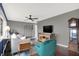 Inviting living room space with a grandfather clock, hardwood floors, and neutral paint tones at 634 Park Dr, Greenwood, IN 46143