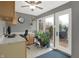 A well-lit office space featuring laminate countertops, tile floor and a walkout to the patio at 634 Park Dr, Greenwood, IN 46143