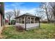 Screened in porch with neutral siding and dark roof at 634 Park Dr, Greenwood, IN 46143