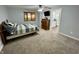 Bedroom featuring natural light from the window and an ensuite bathroom at 6593 N 800 W, Elwood, IN 46036