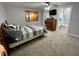 Bedroom featuring natural light from the window and an ensuite bathroom at 6593 N 800 W, Elwood, IN 46036