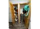 Organized closet with shelving, and additional storage space for cleaning equipment and accessories at 6593 N 800 W, Elwood, IN 46036