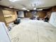 Spacious garage with ample lighting and storage space, perfect for parking and projects at 6593 N 800 W, Elwood, IN 46036