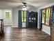 Open living room area with hardwood floors and lots of natural light at 6593 N 800 W, Elwood, IN 46036