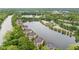 Beautiful aerial view of lakeside apartments with stunning water views and manicured grounds at 6760 Spirit Lake Dr # 11, Indianapolis, IN 46220