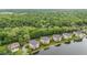 Scenic aerial shot of apartments nestled by a lake, providing a peaceful and picturesque setting at 6760 Spirit Lake Dr # 11, Indianapolis, IN 46220
