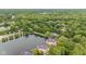 Scenic aerial shot of apartments nestled by a lake, providing a peaceful and picturesque setting at 6760 Spirit Lake Dr # 11, Indianapolis, IN 46220