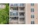 Detailed view of condo balconies with outdoor furniture, creating a cozy and scenic living experience at 6760 Spirit Lake Dr # 11, Indianapolis, IN 46220