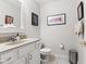 Cozy bathroom featuring modern vanity, mirror, and tile flooring at 6760 Spirit Lake Dr # 11, Indianapolis, IN 46220