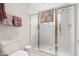 Modern bathroom with a glass-enclosed shower, sleek fixtures, and neutral tones at 6760 Spirit Lake Dr # 11, Indianapolis, IN 46220