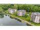 Beautifully landscaped condos on a tranquil lakeside setting, featuring well-maintained grounds at 6760 Spirit Lake Dr # 11, Indianapolis, IN 46220