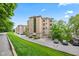 An attractive residential building with a manicured lawn is nestled in lush greenery at 6760 Spirit Lake Dr # 11, Indianapolis, IN 46220