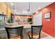 Kitchen featuring a breakfast bar, and seamlessly connecting living spaces, perfect for entertaining at 6760 Spirit Lake Dr # 11, Indianapolis, IN 46220
