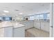 Spacious kitchenette area with ample countertop space, modern appliances, and tile flooring at 6760 Spirit Lake Dr # 11, Indianapolis, IN 46220