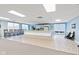 This social club kitchenette is equipped with modern appliances and countertop seating at 6760 Spirit Lake Dr # 11, Indianapolis, IN 46220
