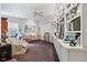 Inviting living room with custom built-ins, neutral color palette, and comfortable seating at 6760 Spirit Lake Dr # 11, Indianapolis, IN 46220