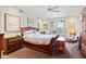 Comfortable main bedroom with a king-size bed, ample natural light, and elegant furnishings at 6760 Spirit Lake Dr # 11, Indianapolis, IN 46220