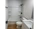 Cozy bathroom featuring a shower-tub combo, white vanity with marble countertop, and modern fixtures at 6845 Arjay Dr, Indianapolis, IN 46217