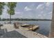 Enjoy lake access from your own dock featuring multiple slips, perfect for boating and relaxing at 6937 Muskrat Dr, , IN 46164