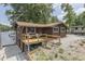 Charming lakeside cabin with a wooden deck and access to the water for peaceful waterfront living at 6937 Muskrat Dr, , IN 46164
