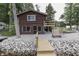 Rustic cabin with lake views, wooden deck and dock for tranquil waterfront living and outdoor enjoyment at 6937 Muskrat Dr, , IN 46164