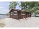 Charming lake house featuring a wood facade and picturesque views of the water at 6937 Muskrat Dr, , IN 46164
