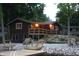 Waterfront home featuring a private dock, lakeside access, and inviting outdoor space at 6937 Muskrat Dr, , IN 46164