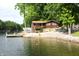 Charming waterfront cabin with a private dock and serene lake views at 6937 Muskrat Dr, , IN 46164