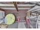 Storage room with lake equipment, chairs, and shelving at 6937 Muskrat Dr, , IN 46164