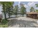 Lakeside yard with a cozy home, offering serene views, ample space, and a tranquil retreat at 6937 Muskrat Dr, , IN 46164