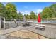Backyard deck with outdoor seating, a bar area, and a view of the swimming pool, perfect for entertaining at 7221 State Road 42, Martinsville, IN 46151