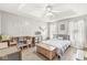 Bright bedroom features a ceiling fan, natural light, and ample space at 7221 State Road 42, Martinsville, IN 46151