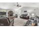 Spacious living room showcasing a brick fireplace, vaulted ceiling, and plush seating arrangement at 7221 State Road 42, Martinsville, IN 46151