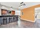 Finished basement with bar, seating, stylish lighting, and an adjacent rec area at 7380 N 225 W, Lebanon, IN 46052