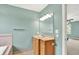 Bathroom vanity with drawers and cabinets, as well as a separate tiled bathtub at 7380 N 225 W, Lebanon, IN 46052