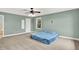 Carpeted bedroom with ceiling fan, natural light, en-suite bathroom and access door at 7380 N 225 W, Lebanon, IN 46052