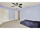 Bedroom features a ceiling fan, LED trim lighting, and carpeted floors at 7380 N 225 W, Lebanon, IN 46052