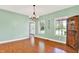Bright dining room featuring wood floors and plenty of natural light at 7380 N 225 W, Lebanon, IN 46052