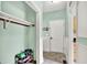 Hallway featuring a coat closet and tile floors at 7380 N 225 W, Lebanon, IN 46052